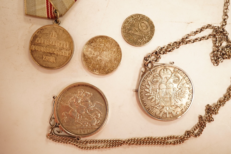 World coins, Victoria, 1891 crown, mounted with chain, Austria, Maria Theresa Thaler, mounted, CCCP medal award, a pierced one rupee India eighteen ninety and a novelty yes no fantasy coin.